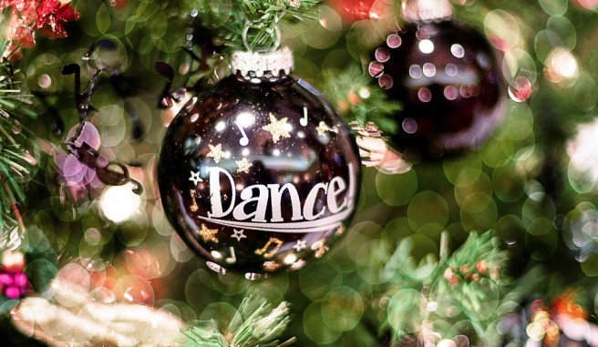 Handmade Christmas Ornament on a Tree with Dance on it